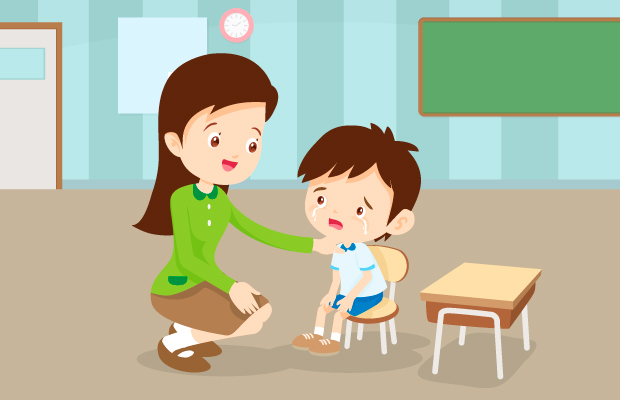 MAESTRA ATENDIENDO A ALUMNO LLORANDO